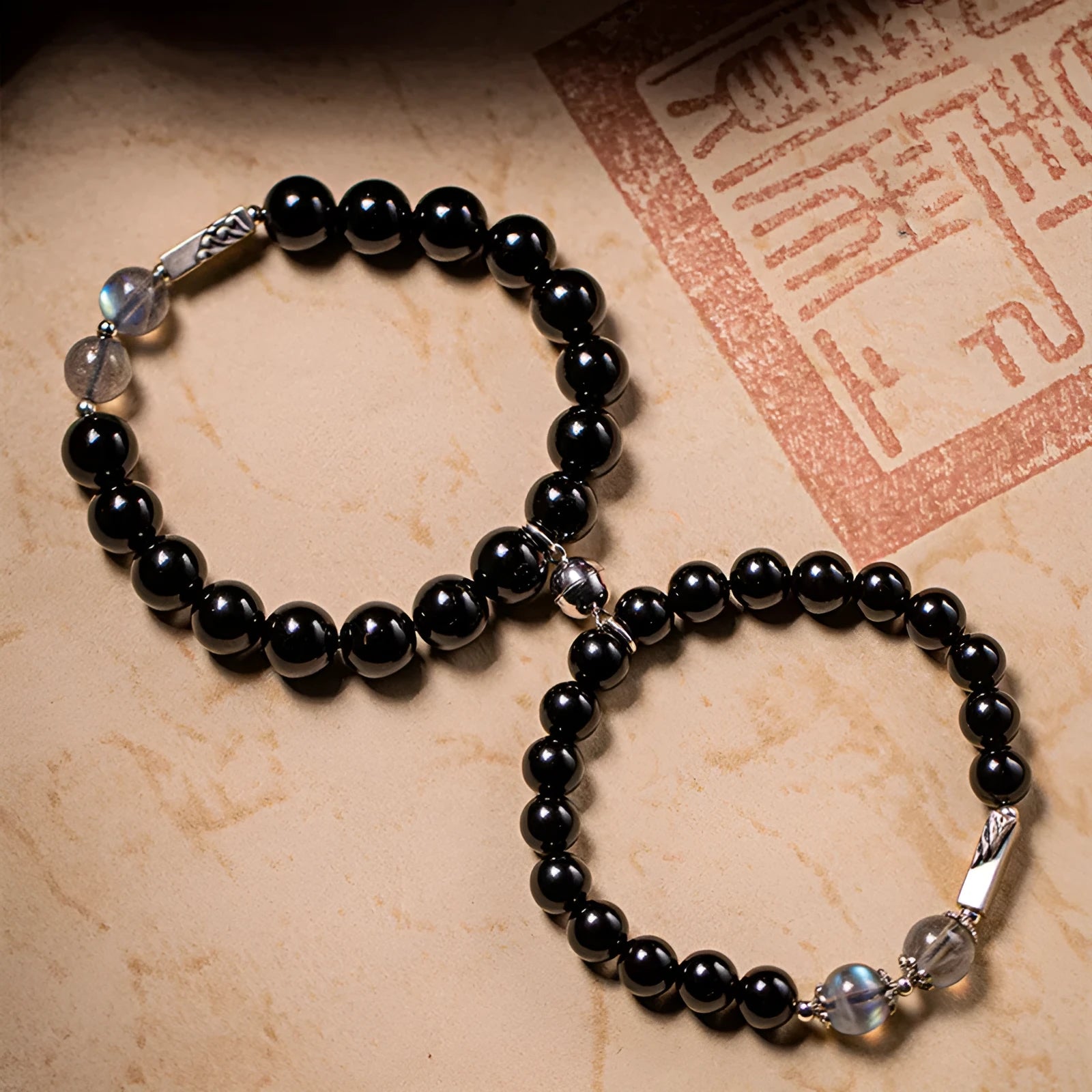 Obsidian Buddha beads DIY couple bracelet kit with 8mm and 10mm beads and thread.