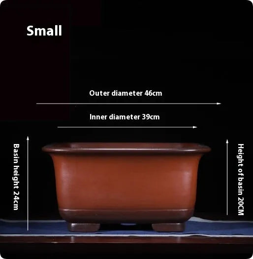 Large purple clay Chinese style flower pot for indoor bonsai or plants.