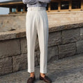 Men's slim fit straight leg formal trousers in black, white, and apricot colours on a size chart background.