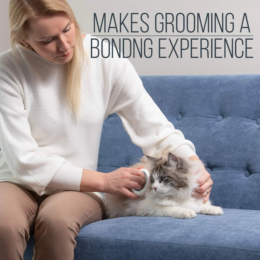 Blue pet grooming comb with ergonomic handle for deshedding and dematting cat and dog hair.