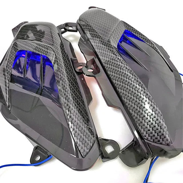 Yamaha NMAX LED side lamp replacement with carbon fibre decoration and blue/red lighting options