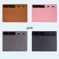 Pink wireless charging mouse pad with phone holder on a desk, dimensions 320mm by 260mm.