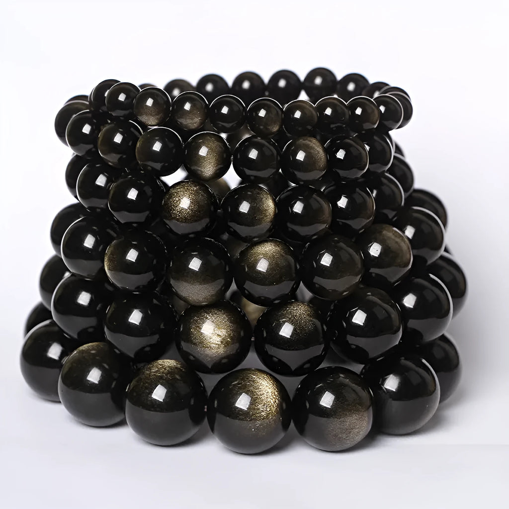 Hand-woven obsidian bracelet with round crystal beads in natural black stone