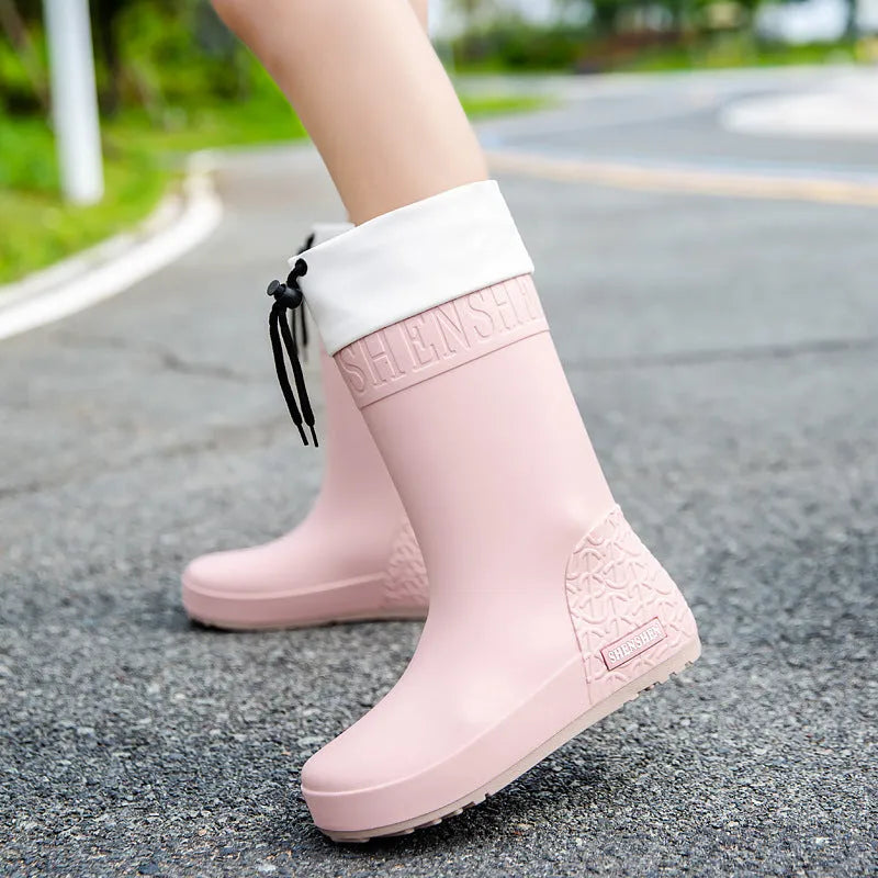 Women's PVC rain boots in non-slip wear-resistant design showing four colour options