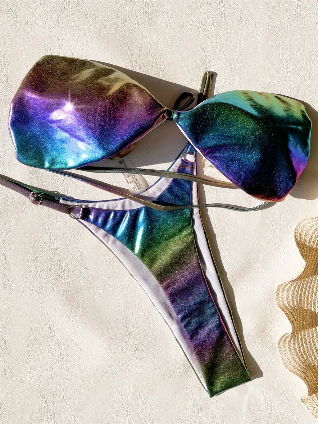 Women's gradient purple bikini set showing colour transition on two-piece swimwear