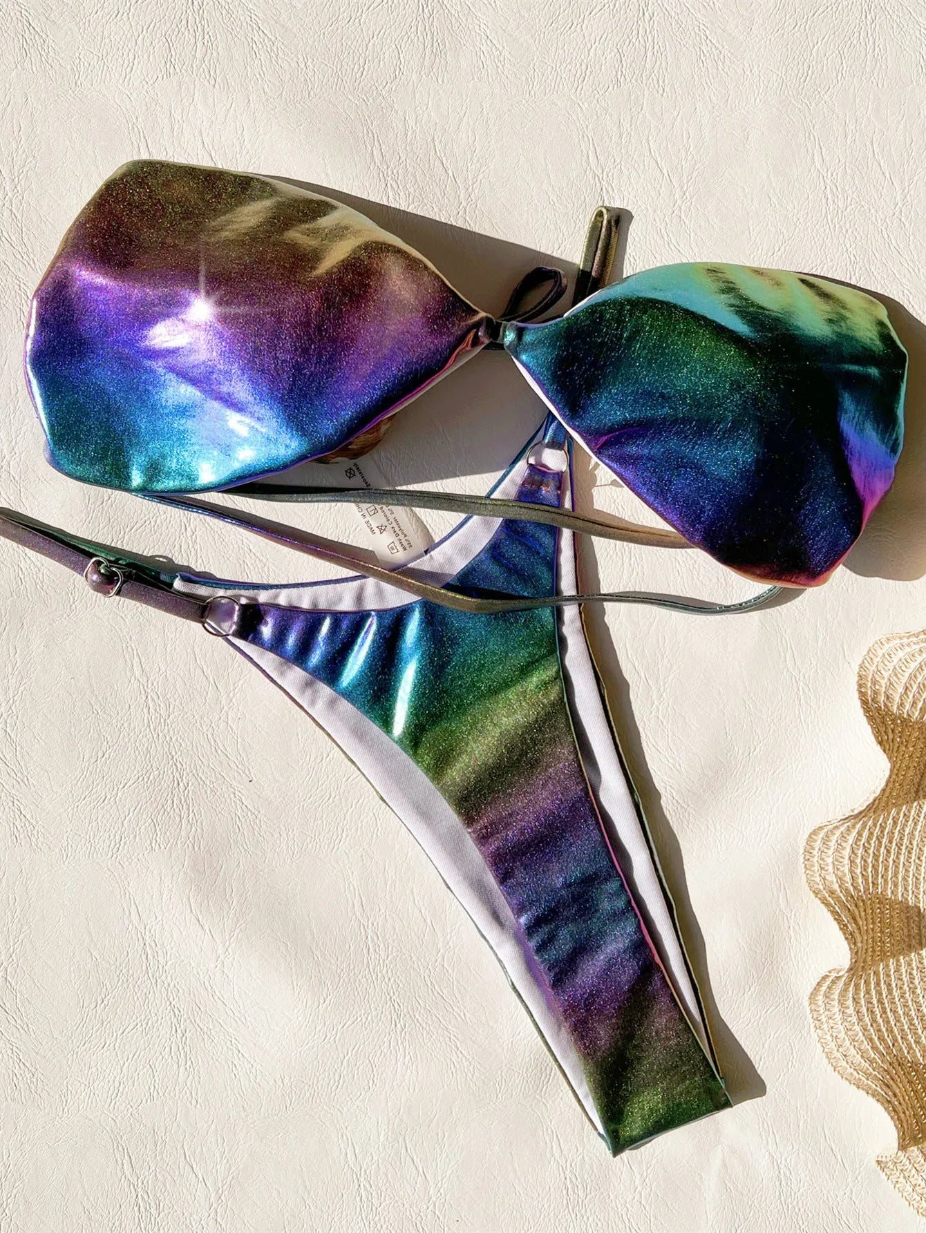 Women's gradient purple bikini set showing colour transition on two-piece swimwear