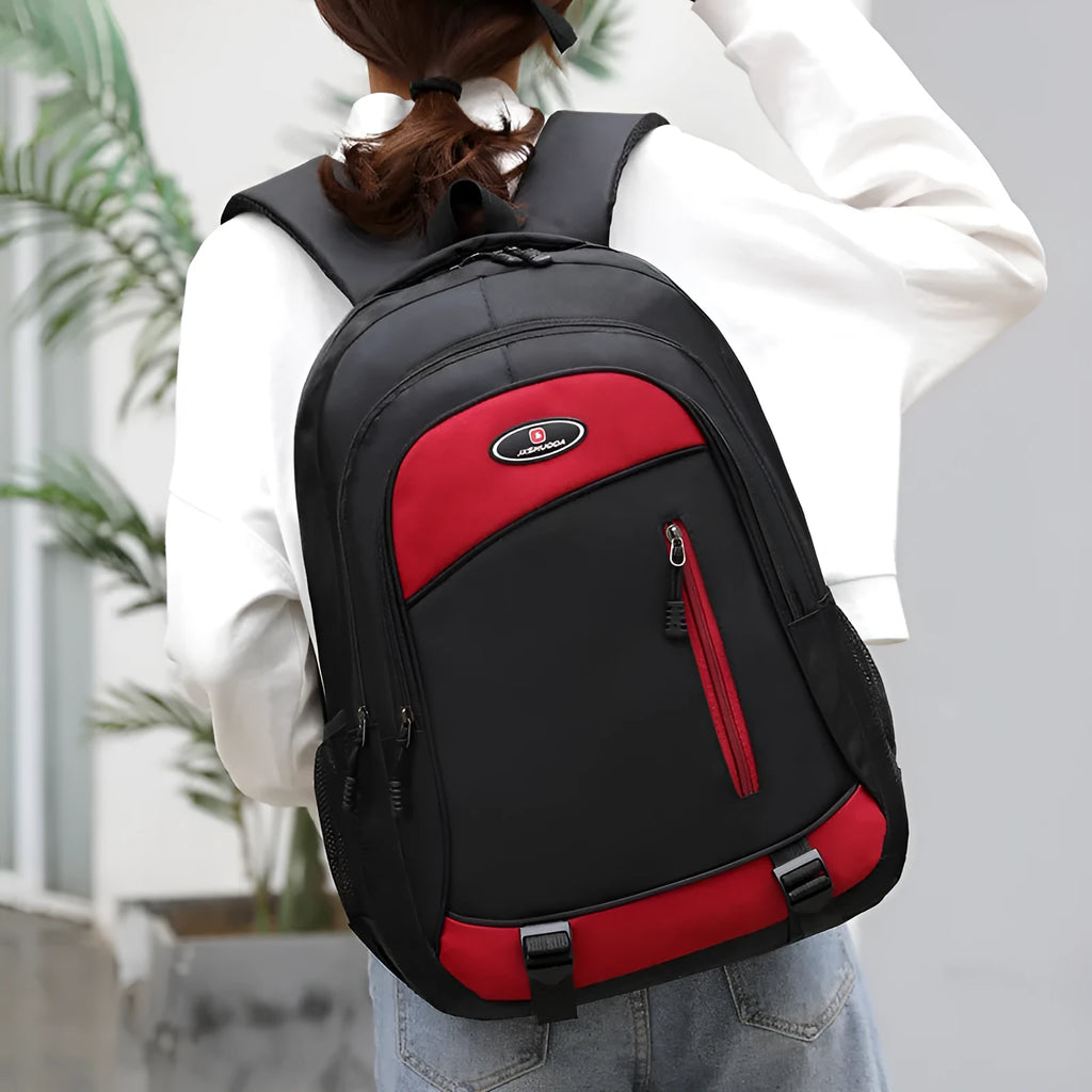 Waterproof nylon middle school backpack with airpillow straps in black, red, blue, and grey colour options
