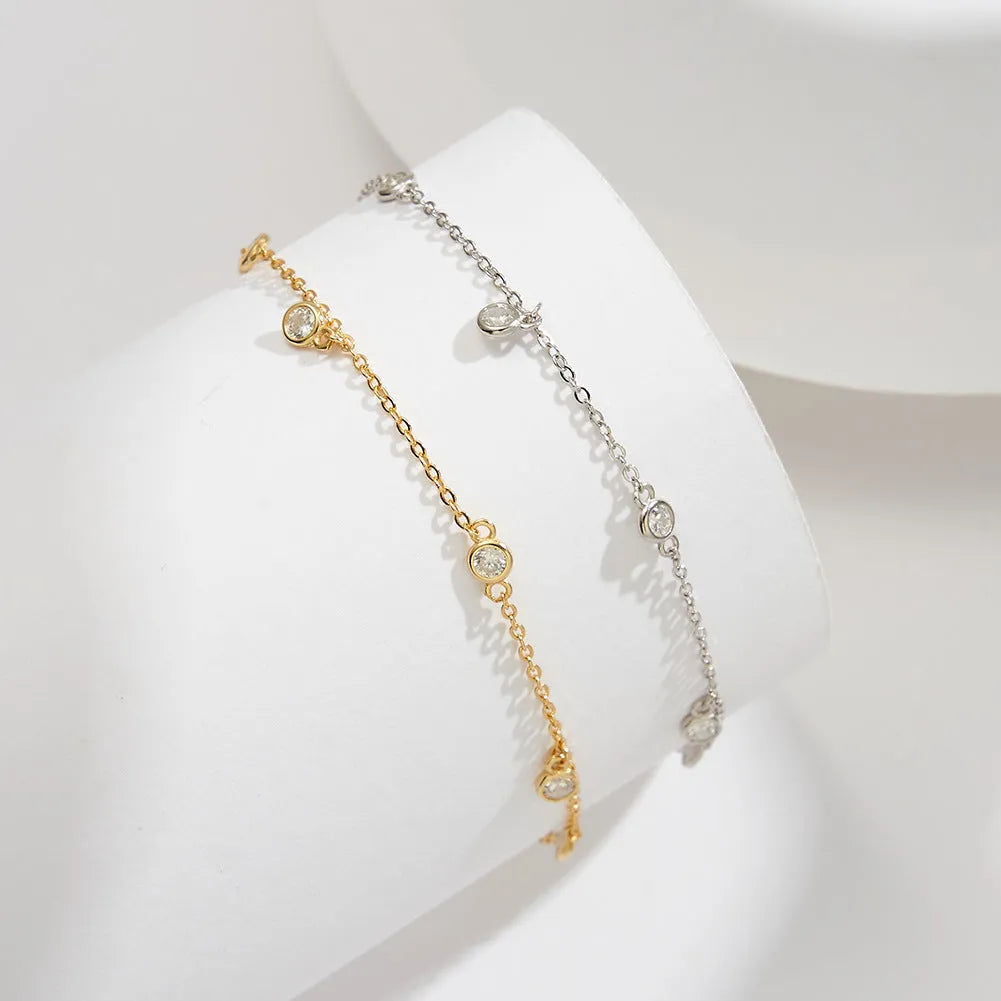 Women's silver anklet with geometric zirconium pendant on adjustable chain