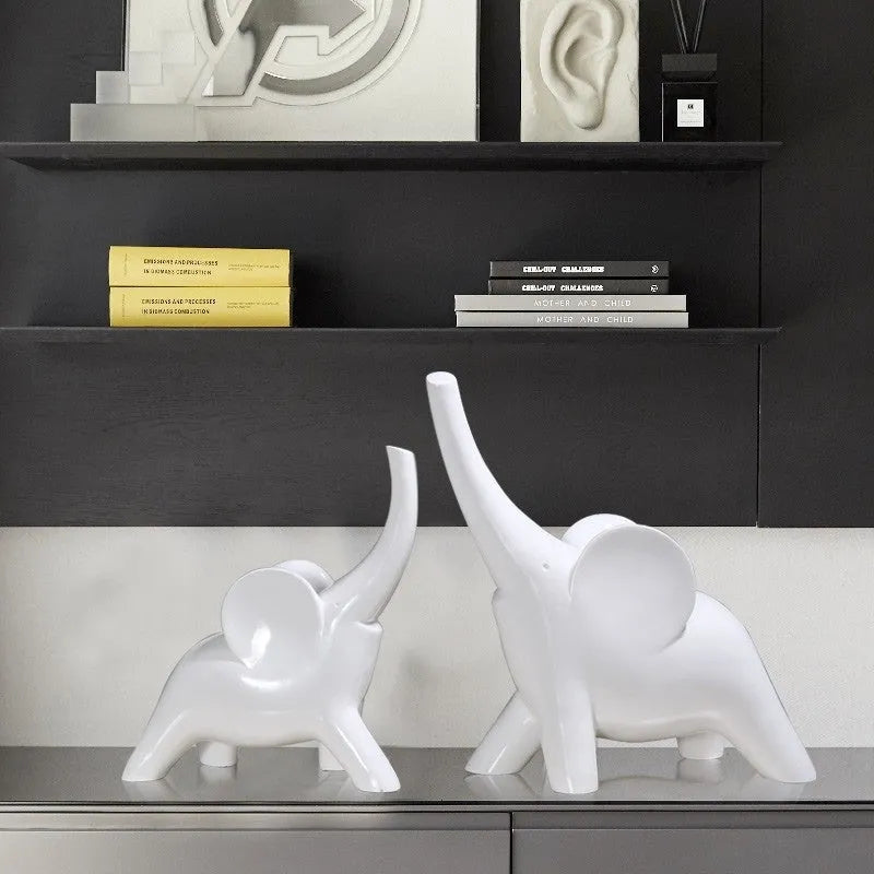 Modern rose gold and white resin elephant ornament figurine for home decor.