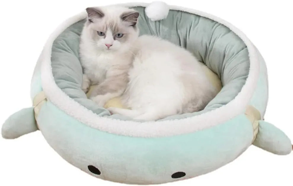 Green dinosaur and chick shaped cat bed that can be used flat or hung as a hammock