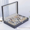 Grey high-grade leather watch storage box with multiple compartments and clear dustproof lids.