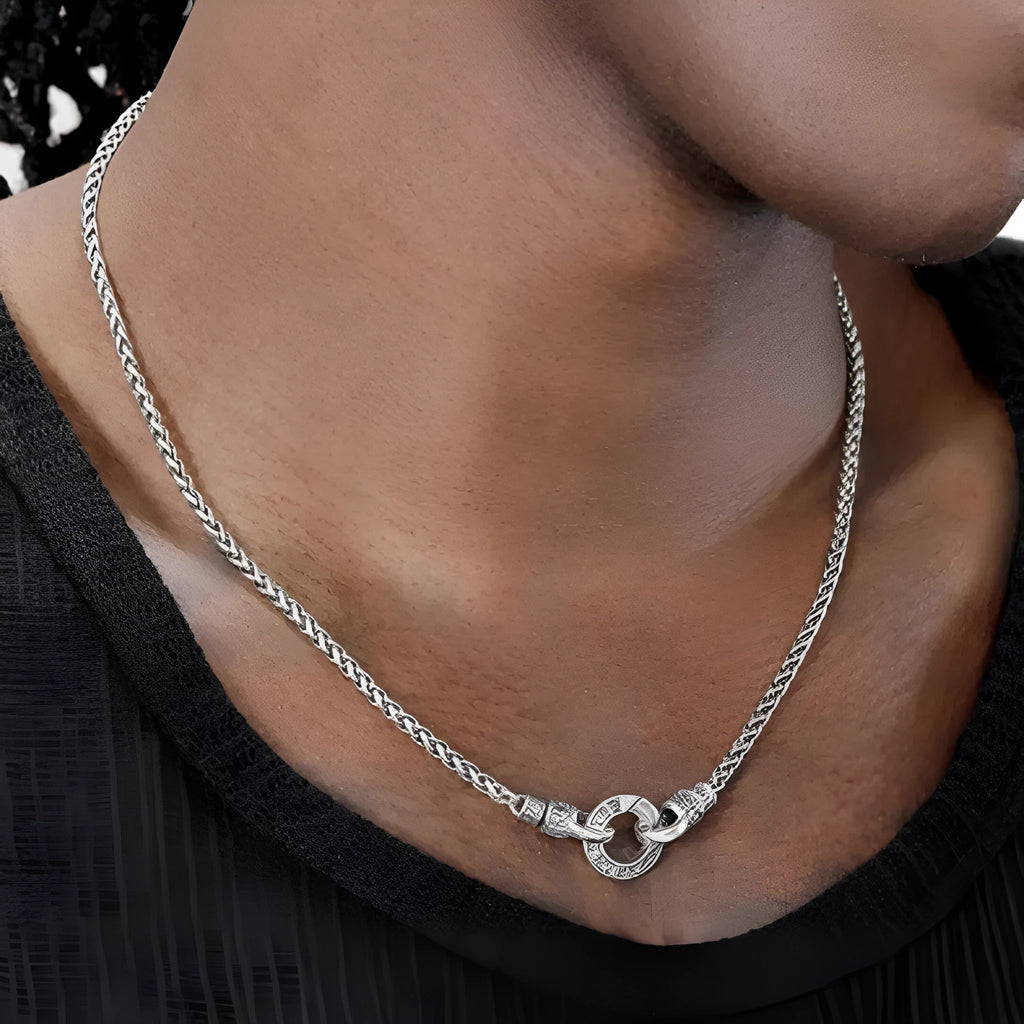 Delicate sterling silver clavicle necklace with pendant on a silver chain.