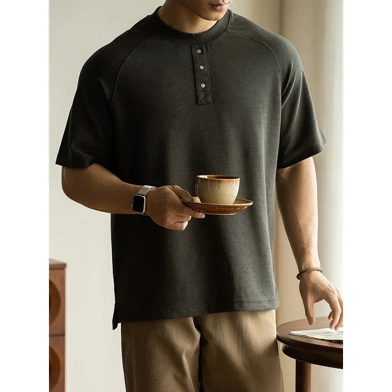 Women's loose-fitting casual pullover top with raglan sleeves in a terry texture fabric.
