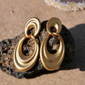 Women's gold tone double circle earrings with French retro styling and U-shaped silhouette