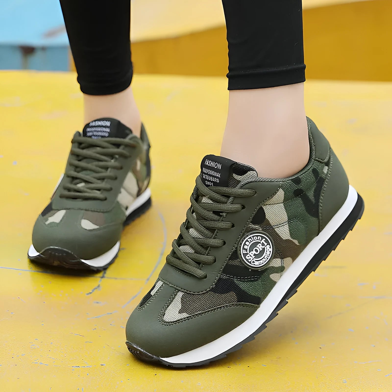 Low-top camouflage pattern suede sports shoes with mesh lining and foam sole.