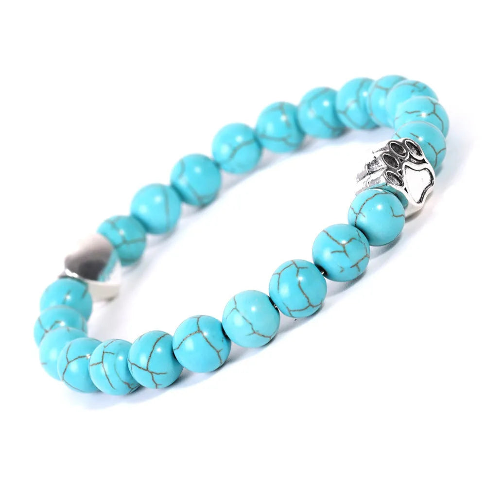 Tigereye Indian agate bracelet with geometric heart charm and dog's paw motifs on wrist