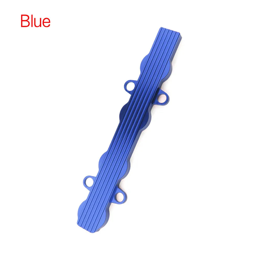 Aluminium alloy engine harness housing bracket in blue, red, and silver, showing versions with and without mounting holes.