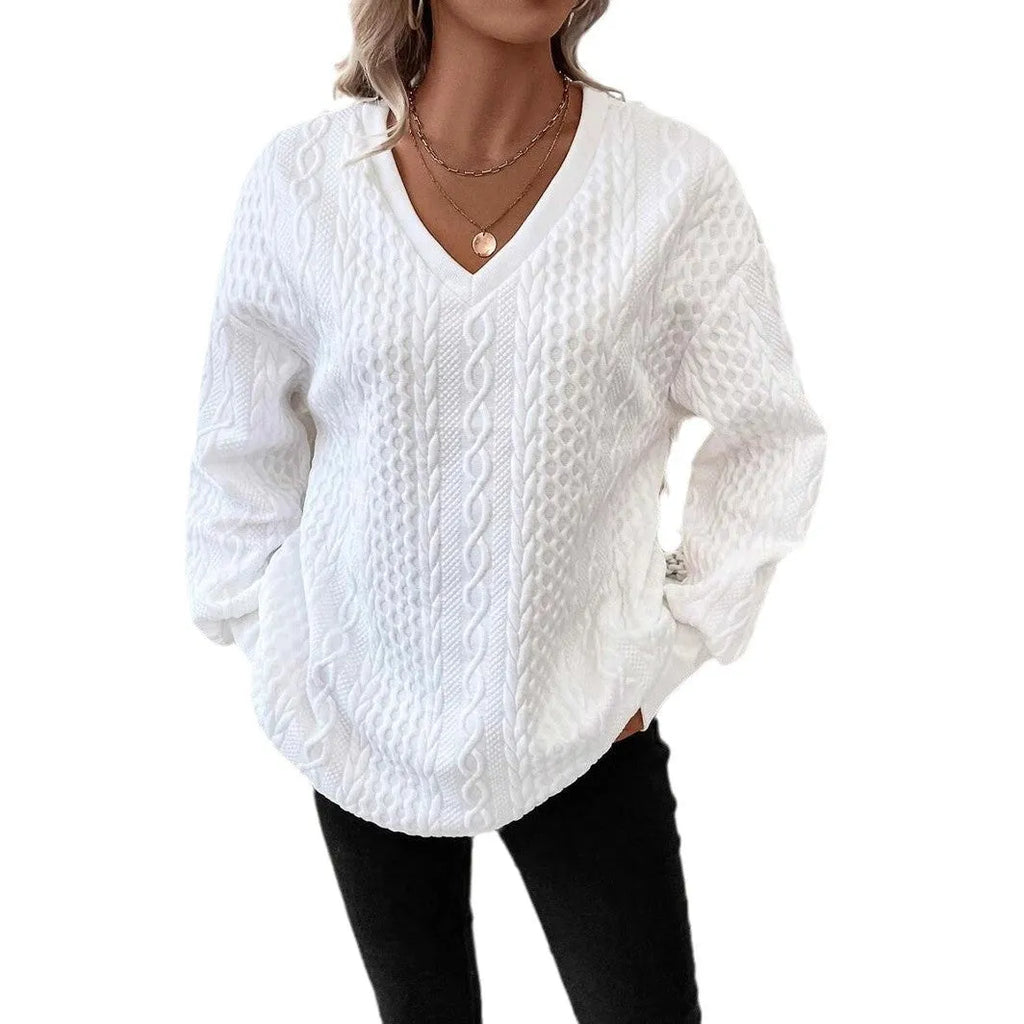 Milky white loose fit casual t-shirt with a raised 3D pattern on the front.