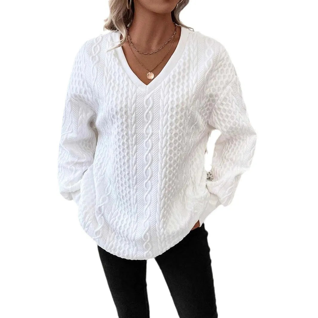 Milky white loose fit casual t-shirt with a raised 3D pattern on the front.