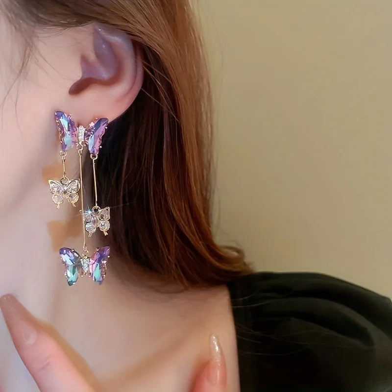 Blue purple alloy drop earrings with crystal flowers, butterfly design and tassel detailing