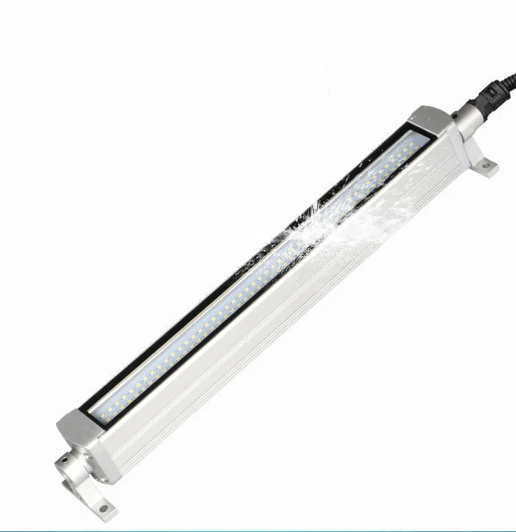 Long 1.2m aluminium LED explosion proof light with tempered glass for mounting on a CNC lathe.