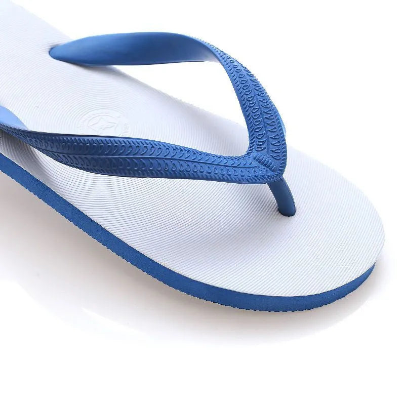 Men's rubber sole flip-flops in green with fish label, showing non-slip tread and casual style.