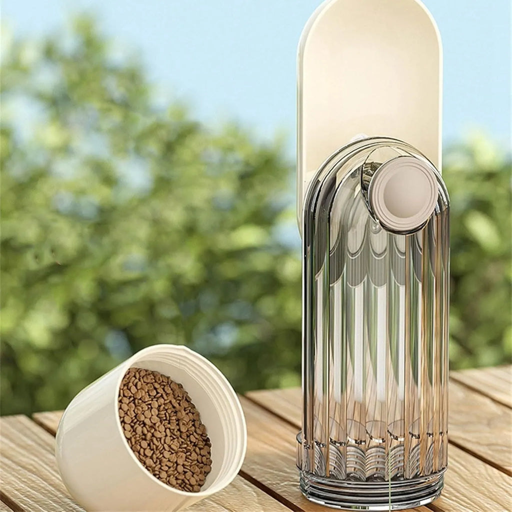 Beige foldable dog water bottle with integrated food container for outdoor walks.