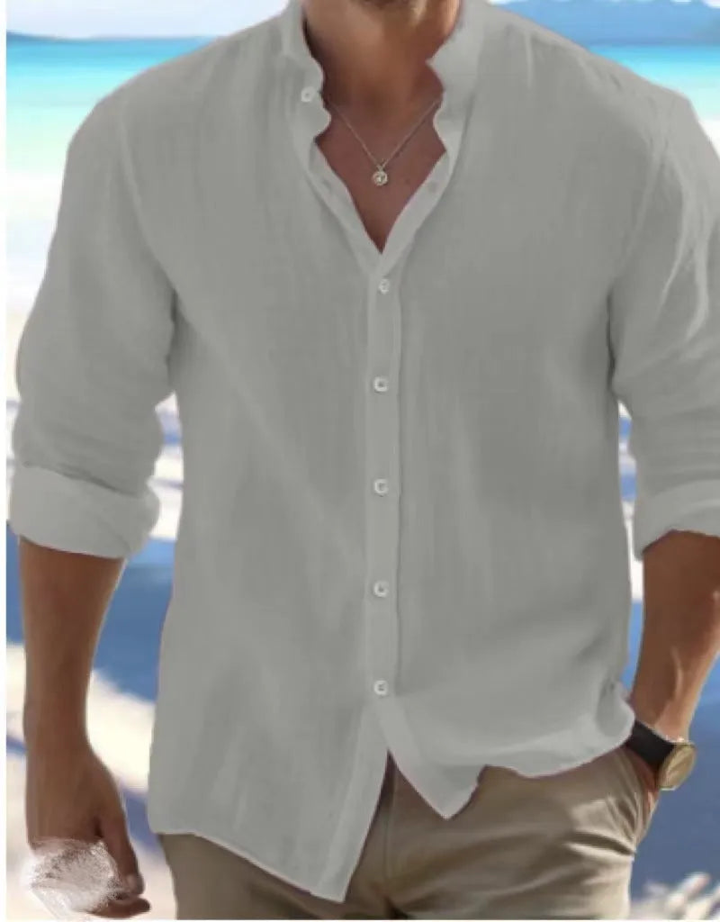 Men's casual button-up summer shirt in long-staple cotton, shown in a light colour on a model.