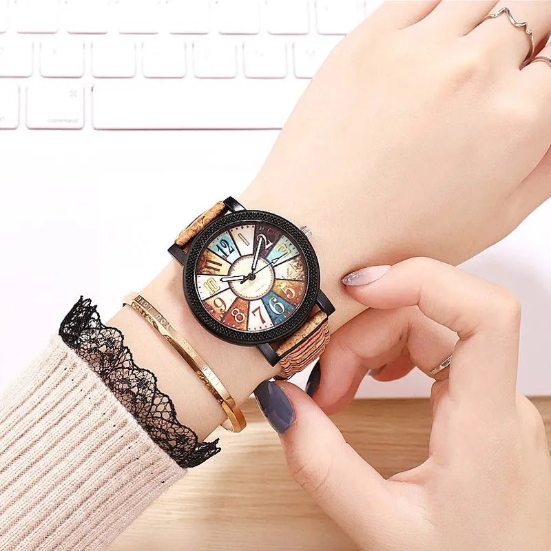 Women's vintage leather quartz watch with 37mm round dial and stainless steel buckle