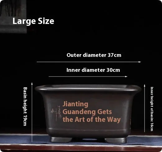 Large purple clay Chinese style flower pot for indoor bonsai or plants.