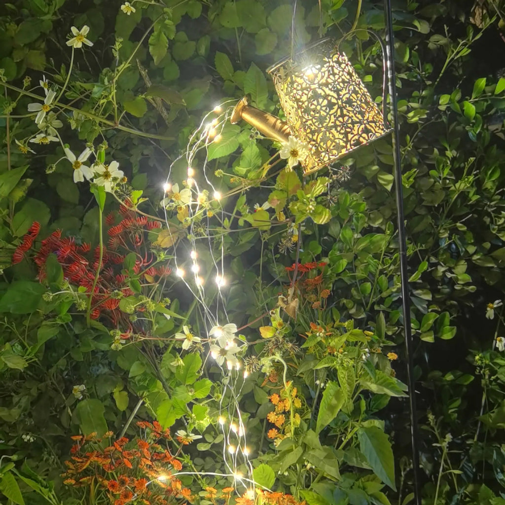 Solar-powered wrought iron kettle light with butterfly design for outdoor courtyard decoration