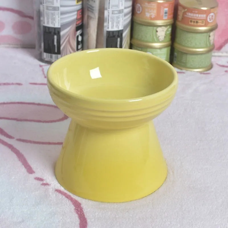 High-foot ceramic pet bowl with chin protector and anti-tumble base design