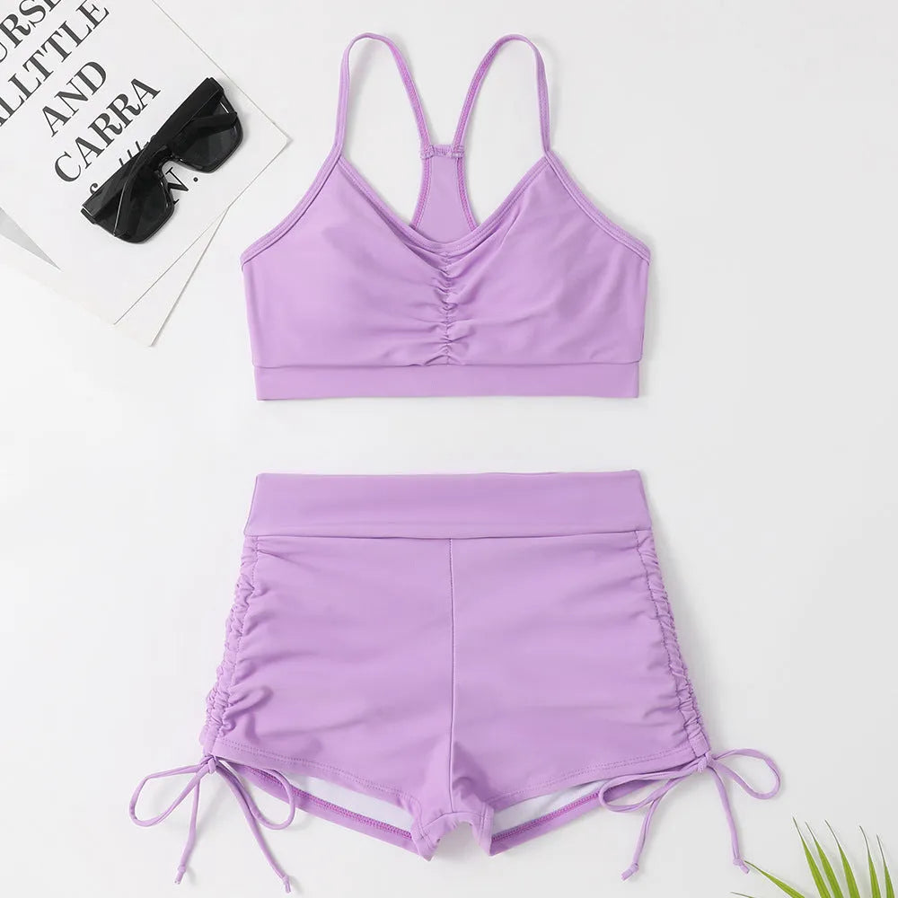 Women's high waist split swimsuit bikini set in black or violet colour with briefs styling