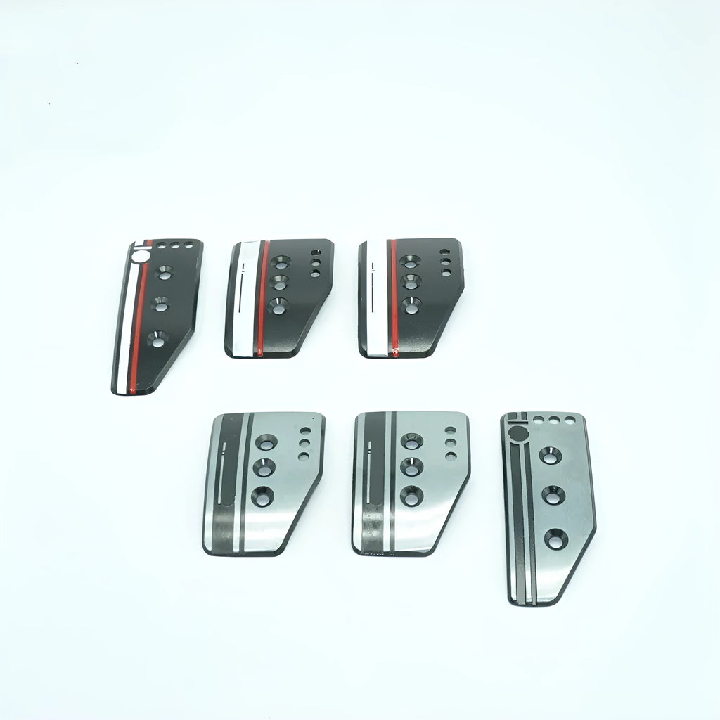 Aluminium alloy manual transmission pedal set showing accelerator, brake, and clutch pedals with mounting hardware