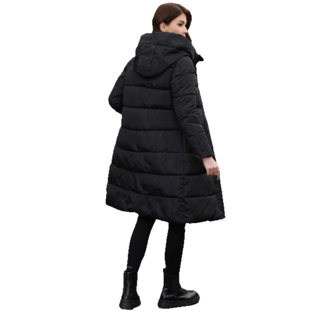 Black hooded long cotton jacket for men with a slim fit design on a model.