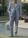 Blue and white striped men's suit set with blazer and trousers on a mannequin