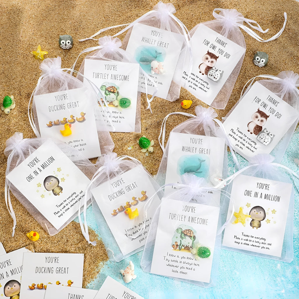 Set of resin memo cards featuring the A Scrape of the Pen pun design, laid out on a surface.