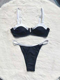 Black low waist women's bikini swimsuit with stitching split detail and briefs style.