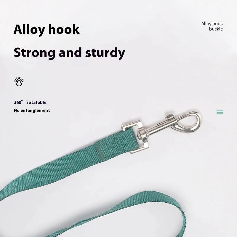 Solid colour polyester dog lead held in a hand, showing one of eleven colour options and its single rope construction.