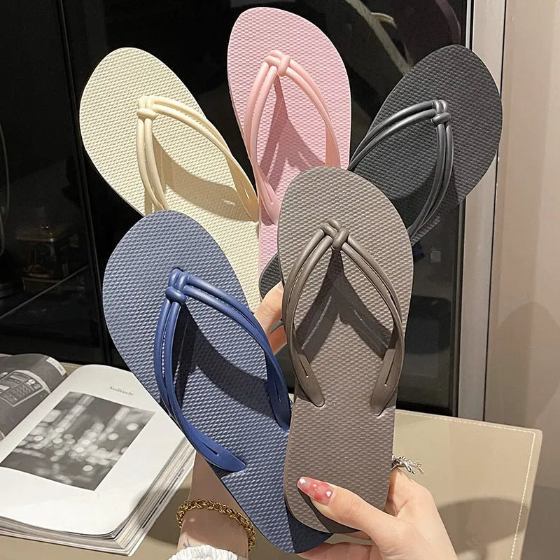Men's casual flip flops with toe covering in PVC material, showing non-slip sole pattern and full foot enclosure design