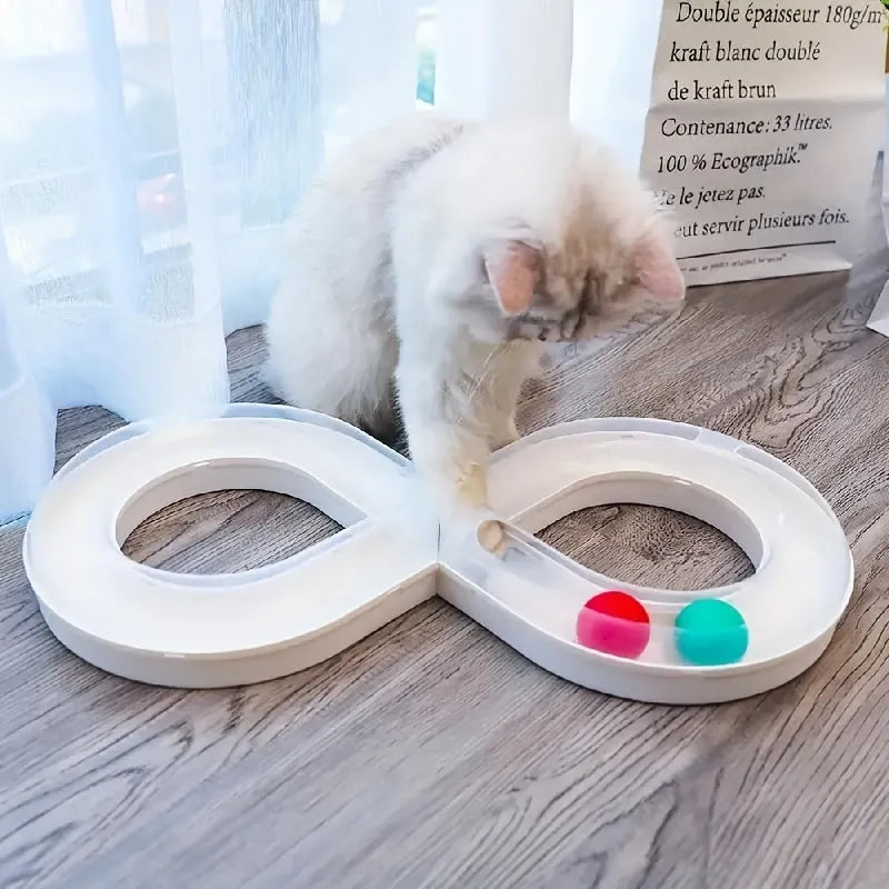 Blue and white cat turntable toy with rotating track ball and teasing stick for feline play