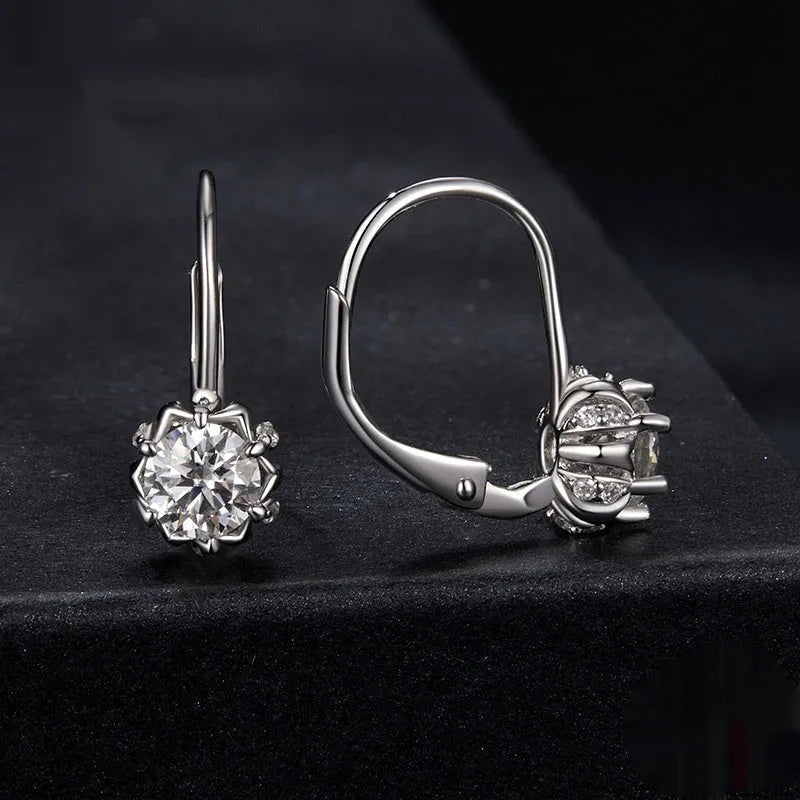 Sterling silver flower bud ear clips with white gold plating and moissanite stone