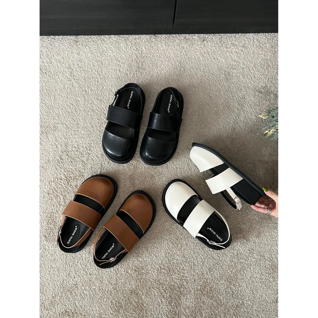 Retro women's closed toe sandals with an adjustable ankle buckle strap in apricot colour.