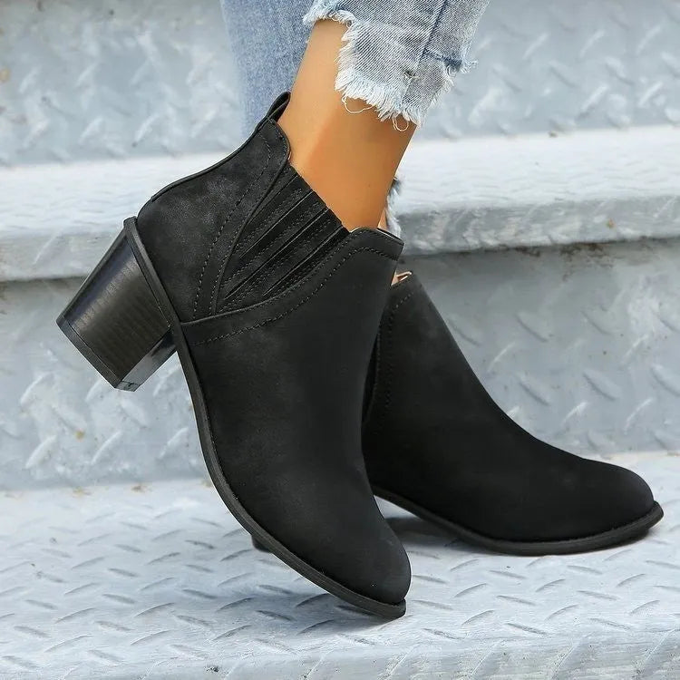 Women's black ankle boots with pointed toe and thick square heel, slip-on design for autumn winter wear