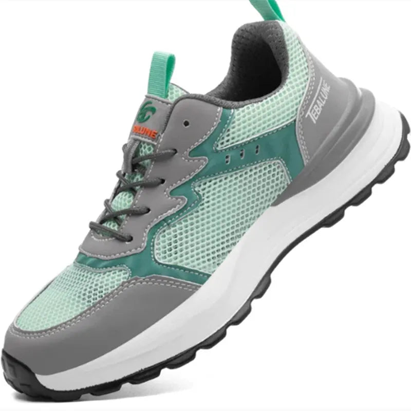Green men's low-top safety shoes with mesh uppers and a plastic toe cap, shown on a white background.