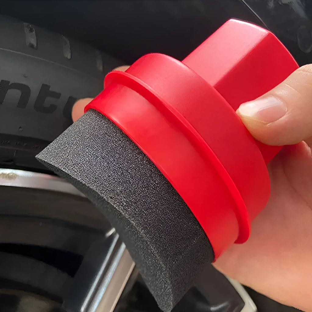 Hand-held car tyre polishing sponge brush with black high-density sponge and a grey PP handle, shown with a separate white lid.