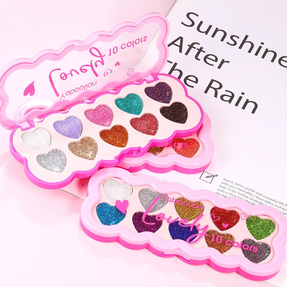Heart-shaped makeup palette open to show ten pearlescent eyeshadow pans in various colours.