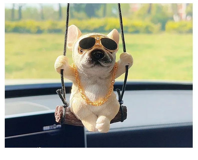 Resin cartoon bulldog car hanging ornament for a rearview mirror in various colours.