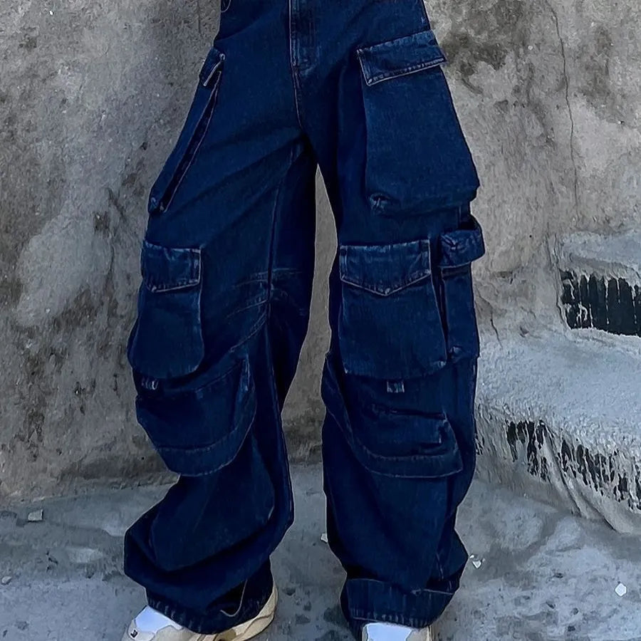 Dark blue distressed wide-leg high waist women's jeans with multiple pockets.