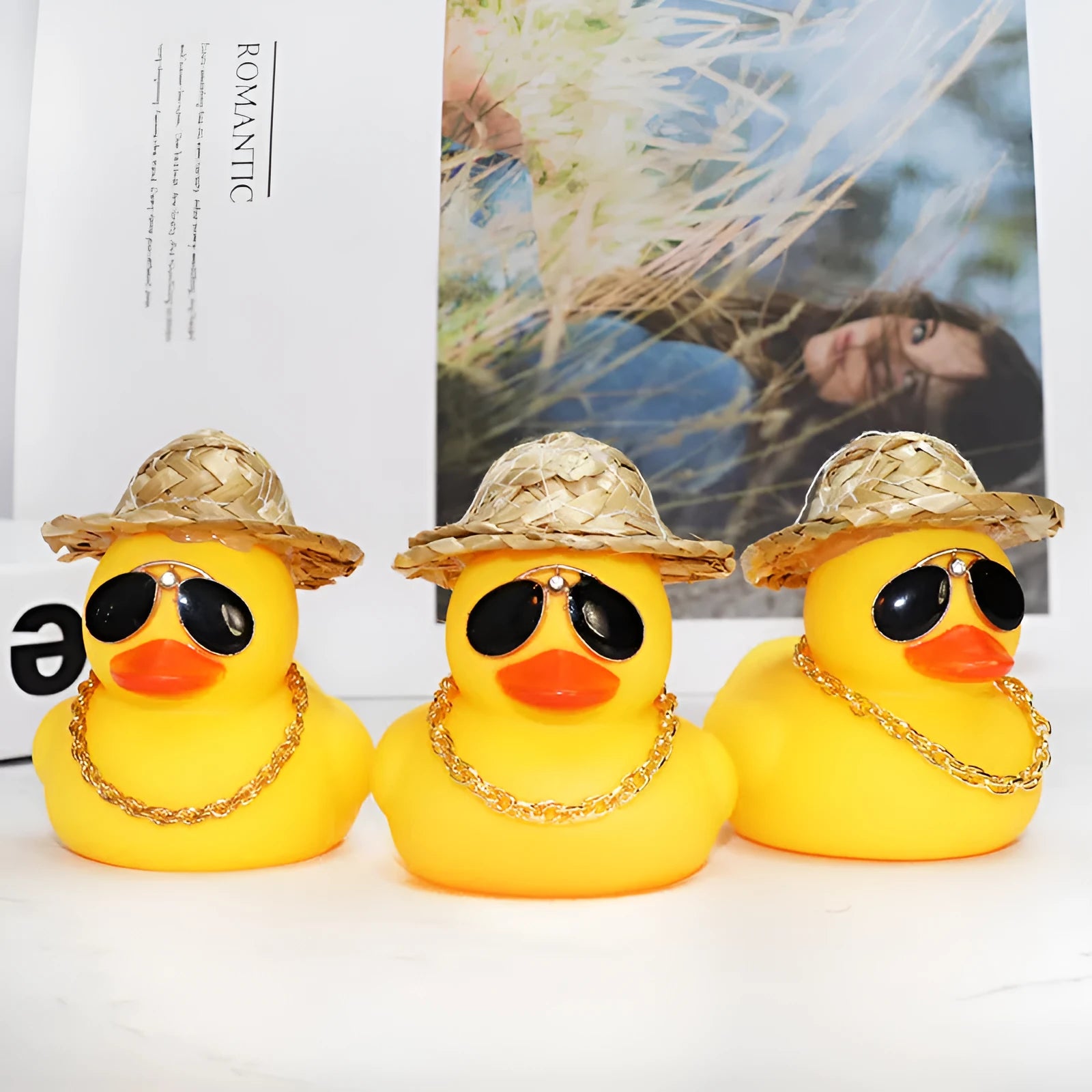 Straw hat yellow duck cartoon car ornament with matte finish and sunglasses accessory